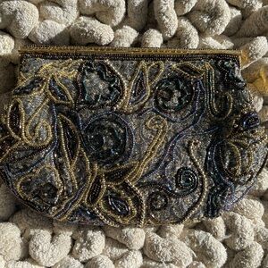 Elegant Gold Beaded Clutch